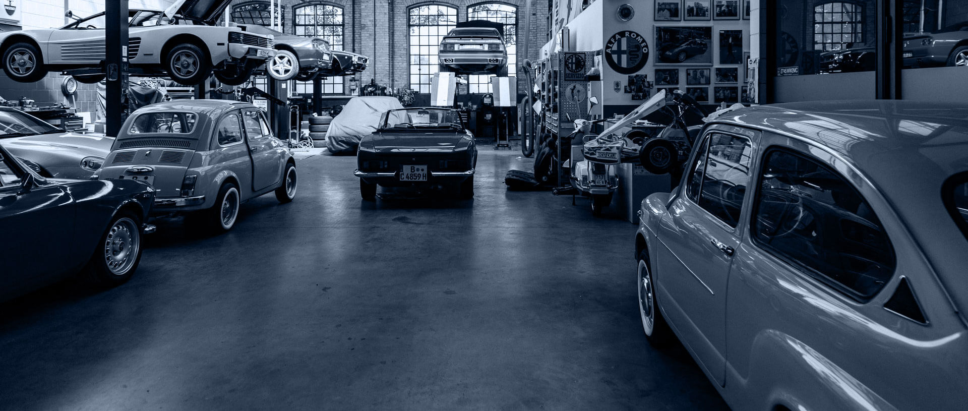 Classic cars in a vintage restoration garage